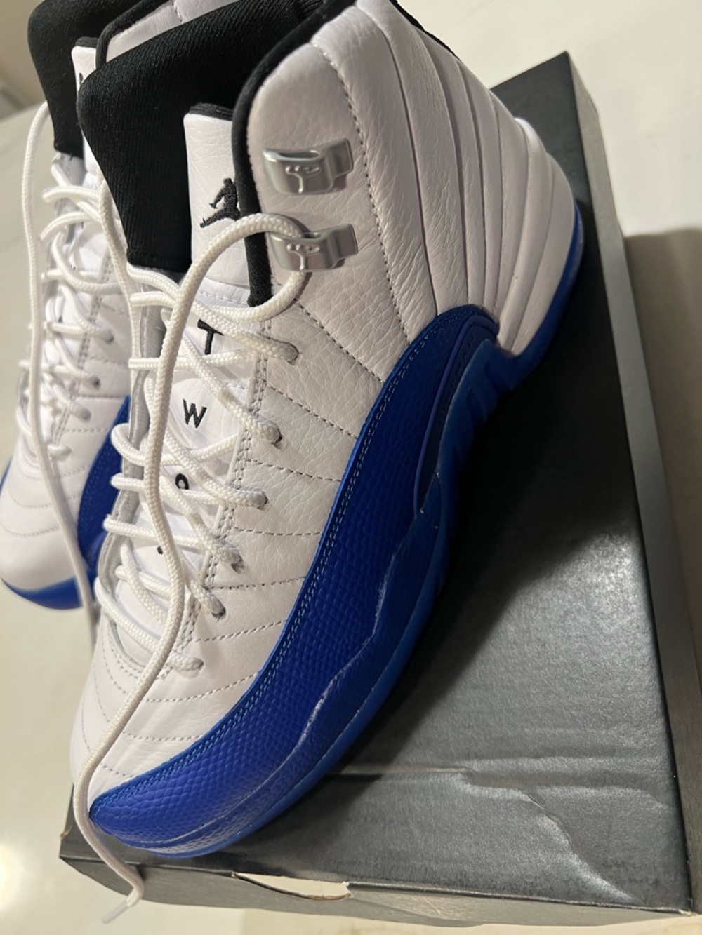 Jordan White and Royal Blue Retro 12 Sneakers - Picture 7 of 13